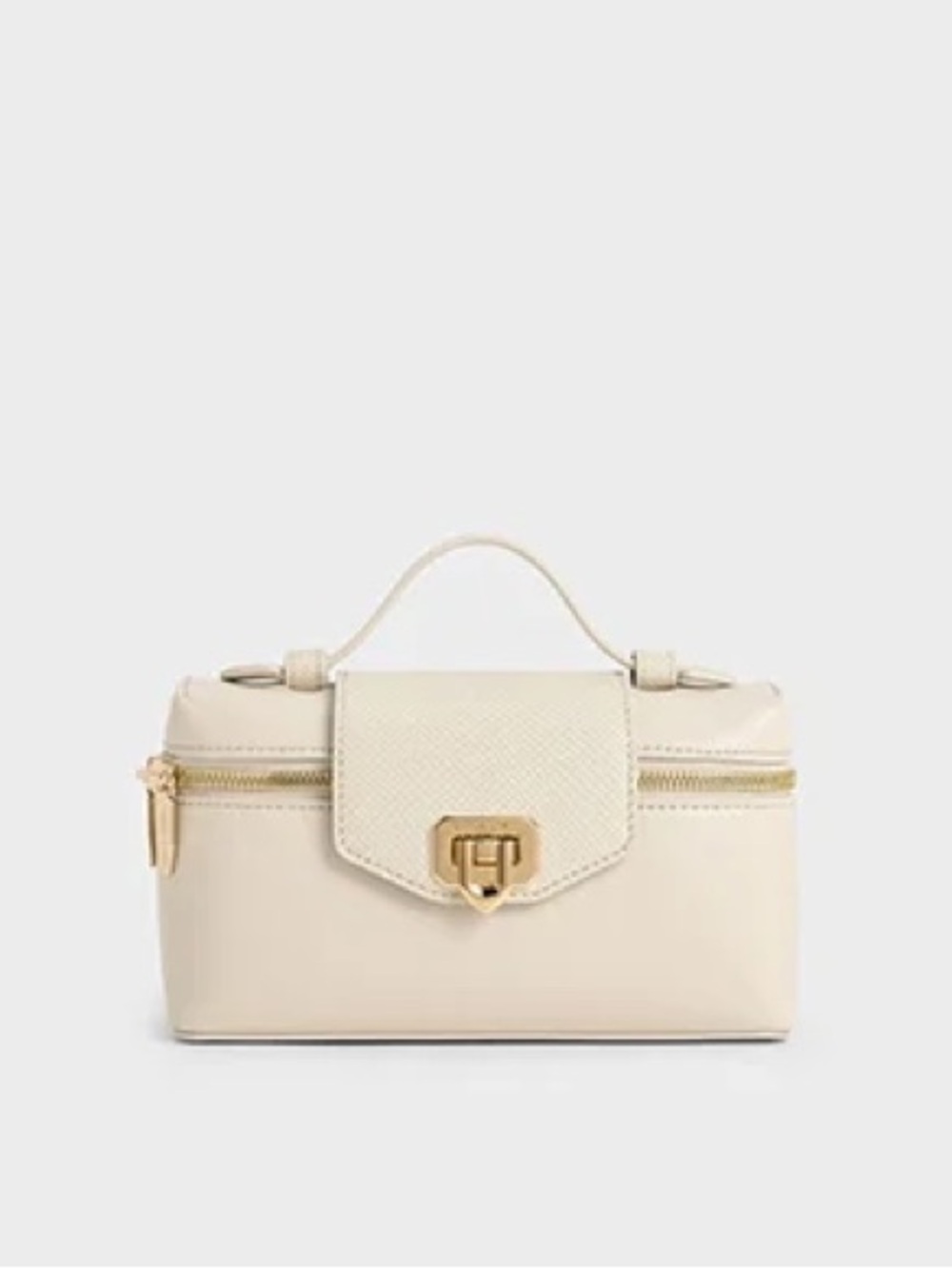 Charles & Keith Elegant Cream Top-Handle Bag with Gold Hardware